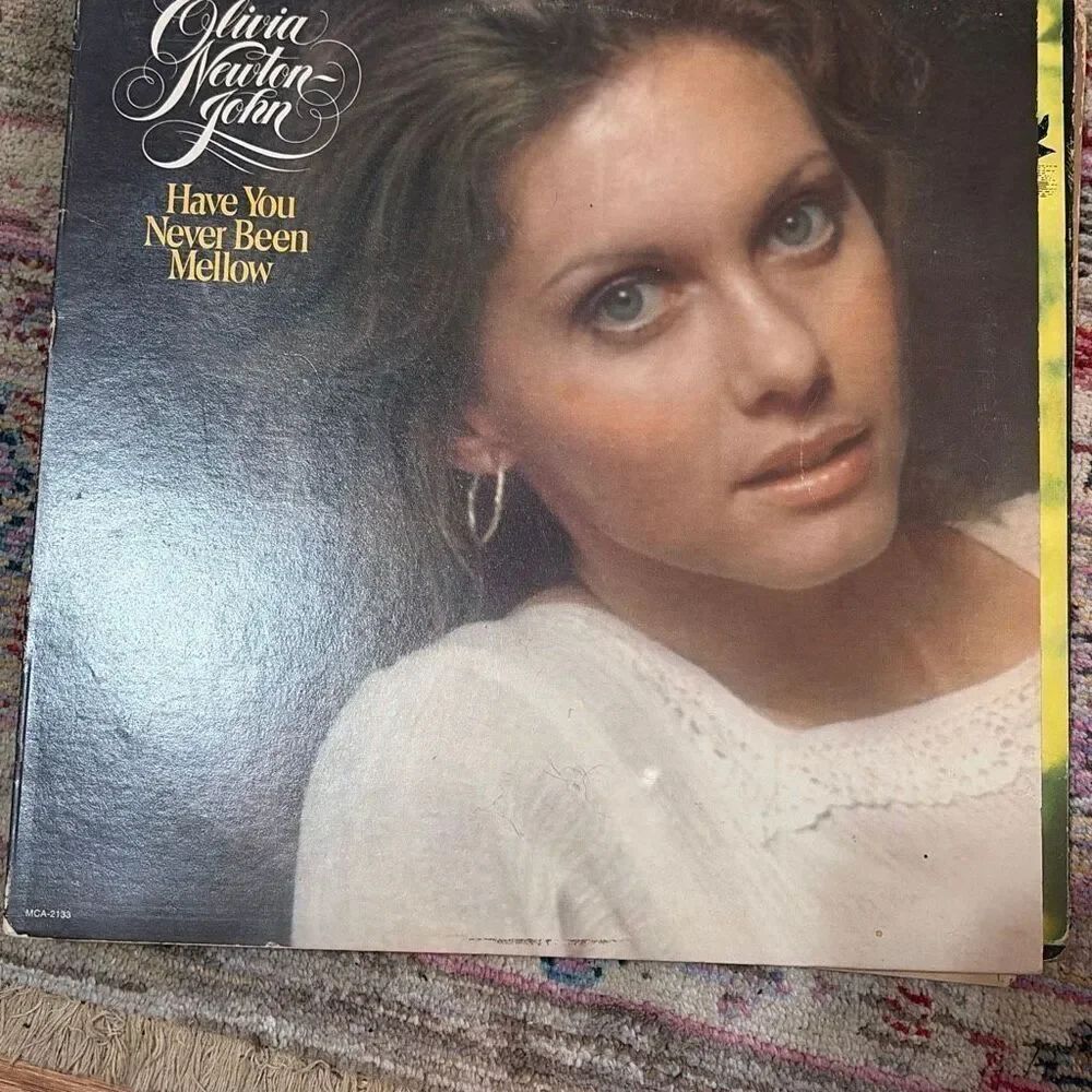 Vintage vinyl, Olivia Newton-John, have you been mellow excellent condition?